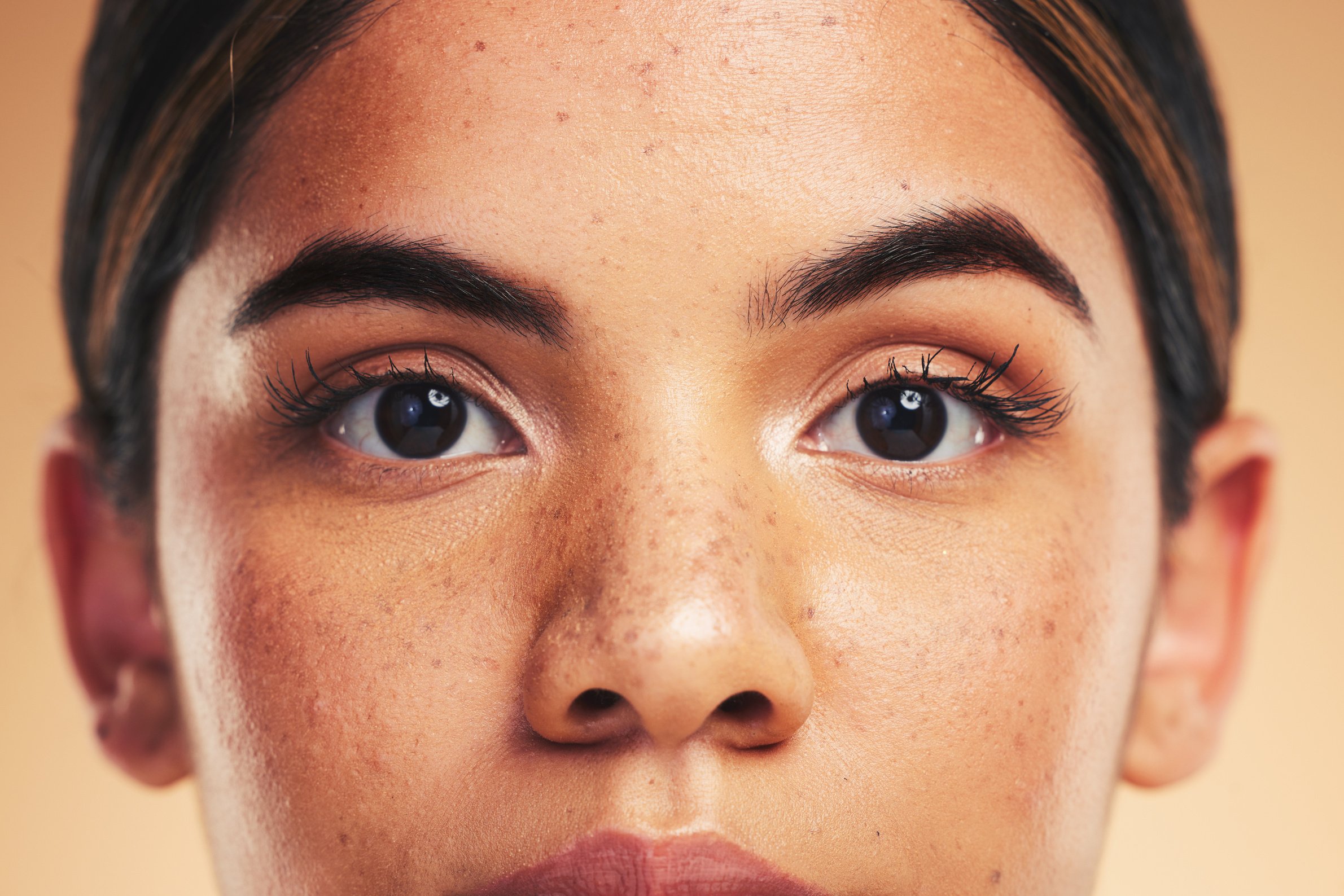 Woman, Skin and Closeup in Studio Portrait with Beauty, Cosmetics and Natural Glow on Face by Background. Girl, Model and Facial Zoom with Change, Melasma and Skincare for Health, Shine and Clean